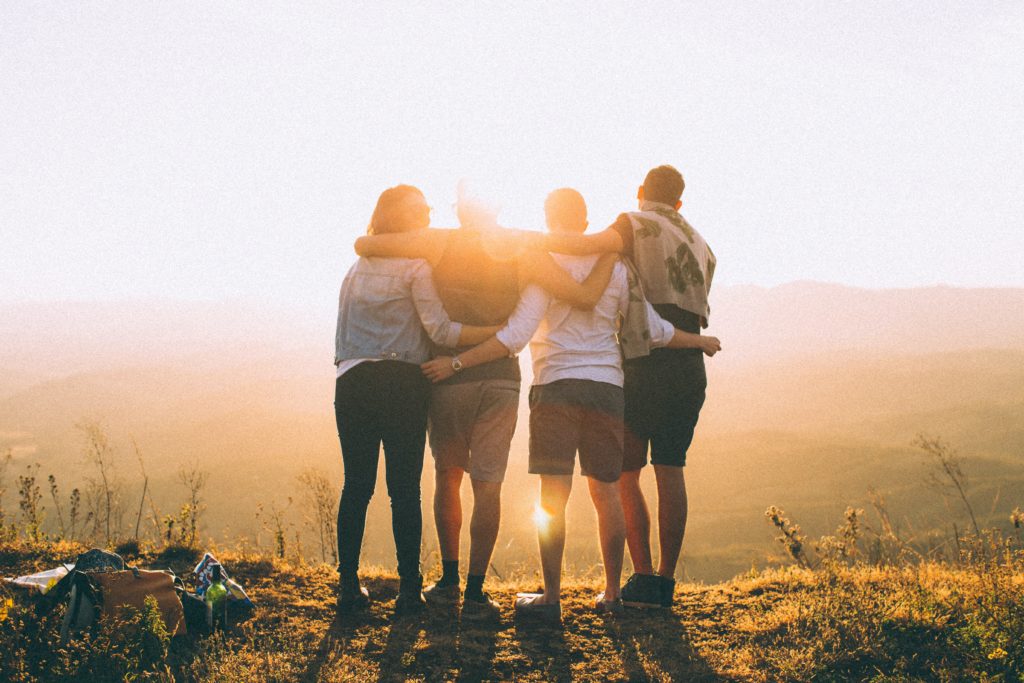 Group of students looking over a beautiful landscape