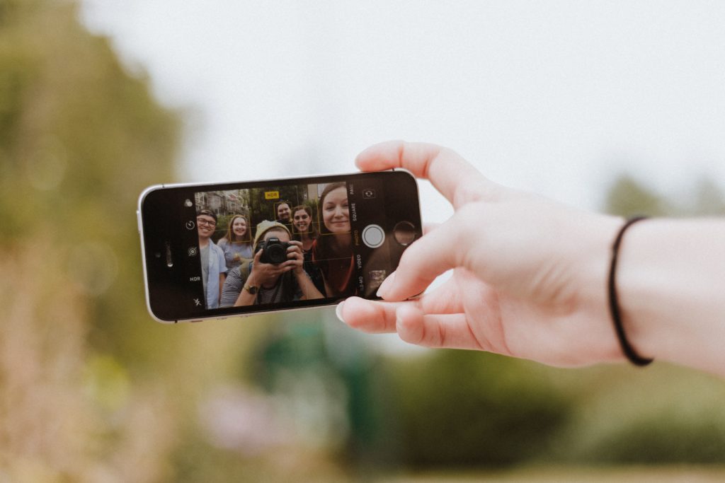 Smart phone camera displaying group of students