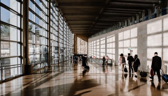 Airport queues with travellers