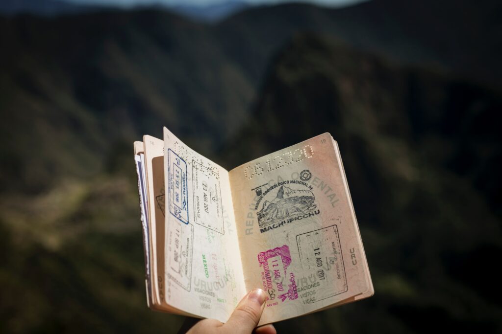Passport open to a page full of stamps
