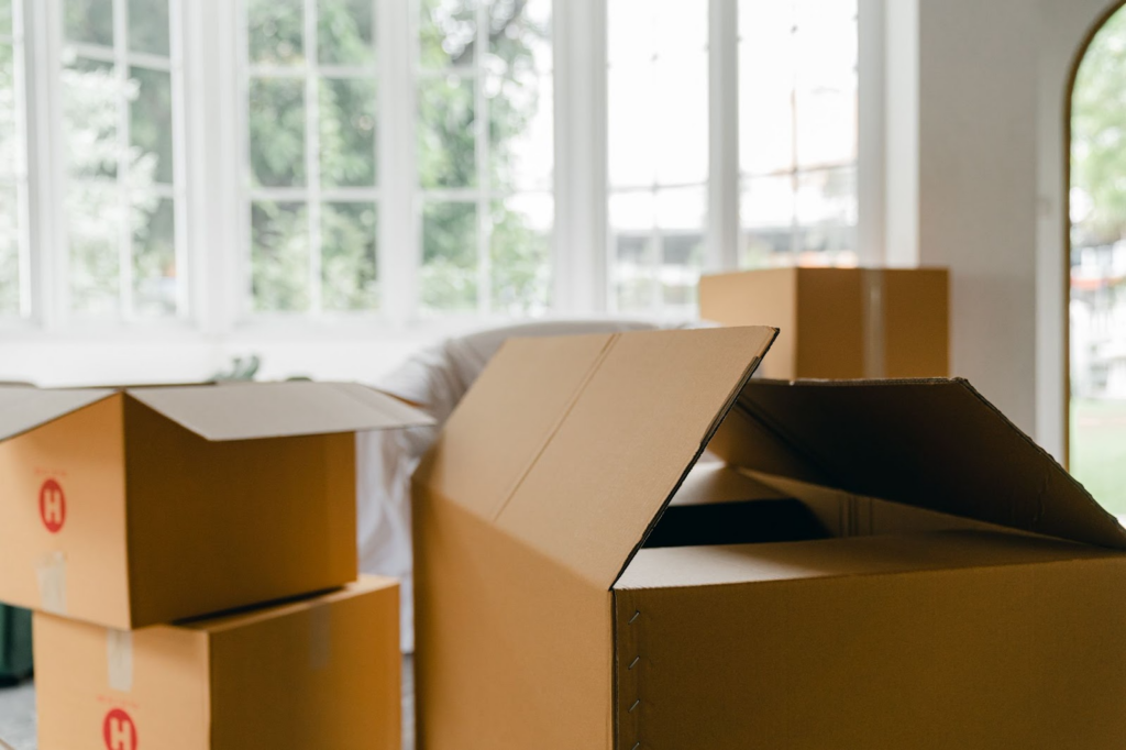 Open cardboard boxes for a move abroad